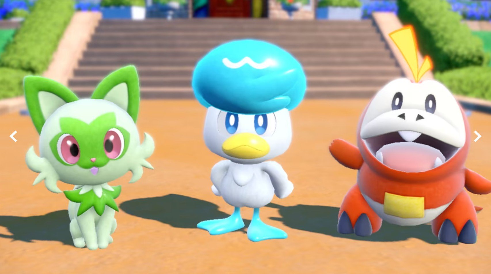 Three different Pokemon stand in a line.